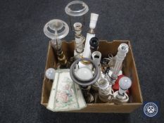 A collection of continental table lamps in white enamel,