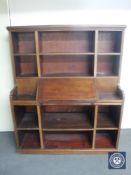 An antique mahogany and pine secretaire bookcase