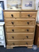 A pine six drawer chest