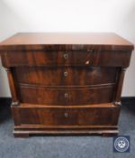 A late 19th century continental mahogany four drawer chest
