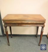 A 19th century mahogany tea table,
