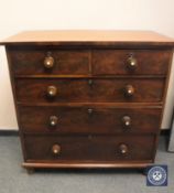 A Victorian mahogany five drawer chest,