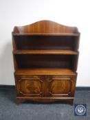 A set of mahogany Reprodux bookshelves