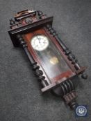 A Victorian mahogany wall clock with enamel dial,
