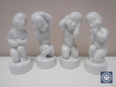 Four Bing & Grondahl figures of children in white glaze, height 11.