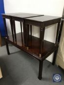 A mahogany oriental style coffee table and three similar lamp tables