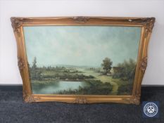 A gilt framed oil on canvas rural landscape