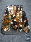 A tray of approximately 35 whisky miniatures