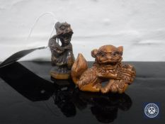 Two carved fruitwood netsuke
