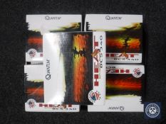 Five boxed Quantum fixed spool reels