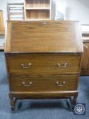 A twentieth century oak writing bureau