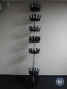 A floor to ceiling shoe rack