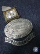 A brass Swiza carriage clock together with a brass Aveling Barford limited machine plaque and one