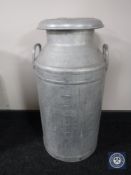 An aluminium milk churn