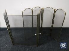Two folding brass spark guards