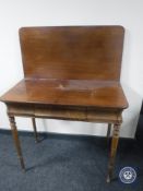 A Victorian mahogany turn over top tea table