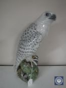 A Royal Copenhagen figure of an eagle on oak leaf plinth, height 39.5 cm.