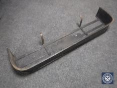 An antique fire curb