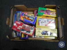 A box of die cast vehicles including Corgi classics delivery vans, Corgi Showmans flat bed truck,
