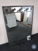 A metal framed mirror