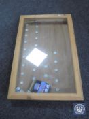 A pine counter topped display cabinet