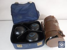 Two lawn bowl bags containing bowls