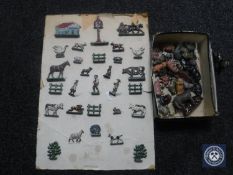 A box of twentieth century lead figures of farm animals together with twenty-nine early twentieth