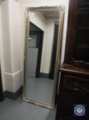 A silvered framed mirror,