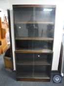 An oak three tier sectional bookcase