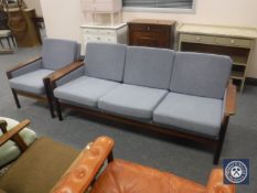 A mid twentieth century Danish wooden framed three seater settee and armchair