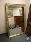 A gilt framed mirror,