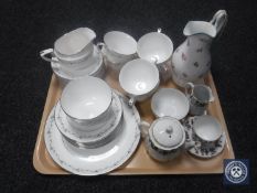 A tray of Royal Worcester Interlude tea service together with a china floral jug and miniature
