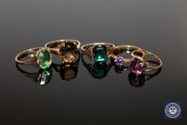 Five yellow gold rings set with gemstones, smokey quartz etc, gross weight 10.4g.