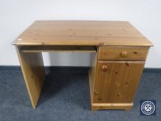 A contemporary pine computer desk