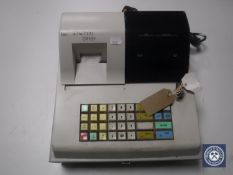 A cash register with key