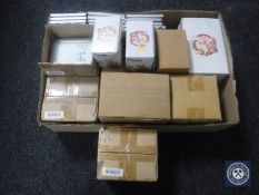 A box of Reflections gift packs and three boxed Piggin ornaments