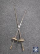 A pair of fencing foils