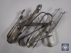 Eight pairs of Georgian silver sugar tongs,