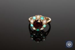 A cluster ring set with seed pearls in yellow 9ct gold, size I.