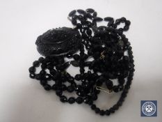 A small collection of Jet jewellery, necklaces, brooch etc.