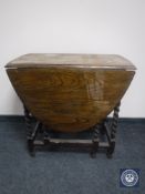 An oak barley twist gateleg table