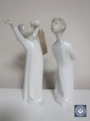 Two Lladro figures, Boy Awakening and Boy Whistling,