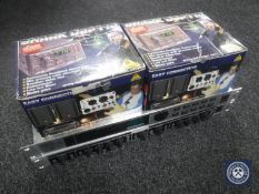 Two boxed Behringer Shark DSP110 Feedback Destroyers together with a Feedback Destroyer Pro and
