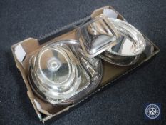 A box of 20th century plated wares including salt and pepper pots, tureens,