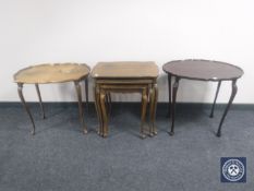 A nest of three walnut tables on cabriole legs together with two pie crust edge tables