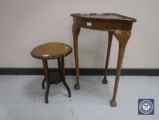 An oak pie crust edge plant stand together with a walnut corner table on claw and ball feet