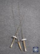 Three fencing foils