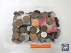A tub containing pre-decimal British coinage,