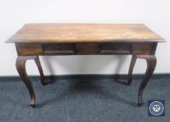 A hardwood side table fitted two drawers