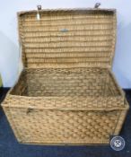 A wicker laundry hamper